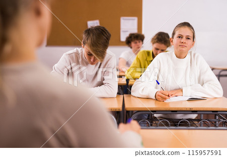 Teenager boy and girl studying in classroom 115957591