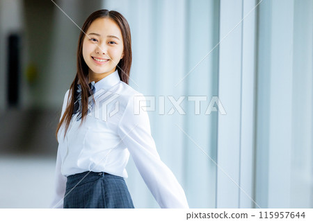 High school girl in a shirt looking back 115957644