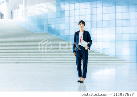 Young business woman in the office Young business woman in the office 115957657