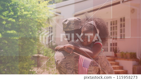 African American young adult hugging biracial student outside house 115958273