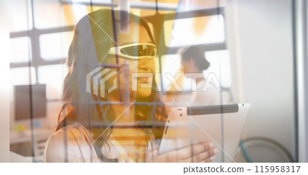 Biracial young adult holding tablet, looking through window 115958317