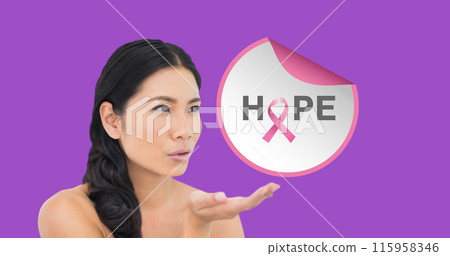 Asian nurse holding symbol for breast cancer awareness 115958346