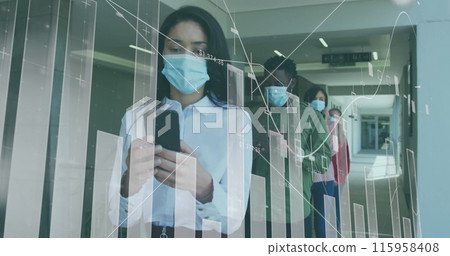 Diverse team analyzing data on glass wall, wearing masks 115958408