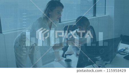 Black team leader & white senior specialist work at a computer 115958429