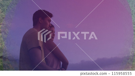 Diverse couple embracing, looking into distance Diverse couple embracing, looking into distance 115958555