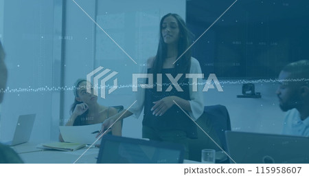 Diverse group of friends discussing in office, one holding tablet 115958607