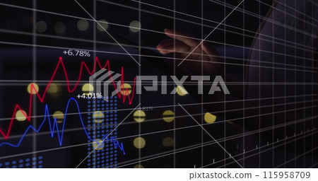 A person wearing dark outfit pointing at a digital graph showing market trends 115958709