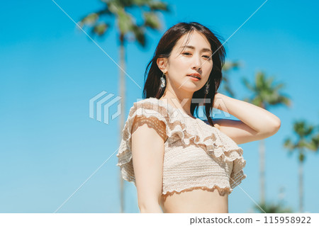 Young woman beach resort image 115958922