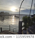 a wooden pier at sea in the afternoon 115959978