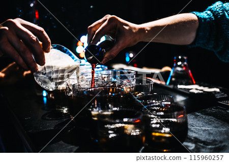 Bartender Crafting Creamy Coffee Cocktails at a Night Bar 115960257