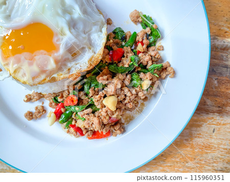 Rice with spicy stir-fried pork and basil leave Rice with spicy stir-fried pork and basil leave 115960351