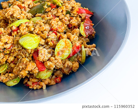 Thai Southern Food, Stir Fried Minced pork with yellow curry, Kua Kling Thai Southern Food, Stir Fried Minced pork with yellow curry, Kua Kling 115960352