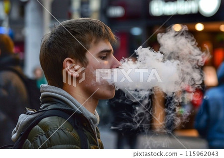 Man smoking cigarette 115962043