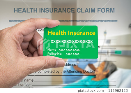 Health insurance card in someone hand. 115962123