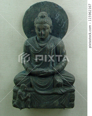 A seated statue of the Buddha on display at the Peshawar Museum in Pakistan, a strategic point of Gandhara A seated statue of the Buddha on display at the Peshawar Museum in Pakistan, a strategic point of Gandhara 115962167