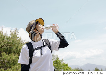 Woman enjoying hiking 115963162