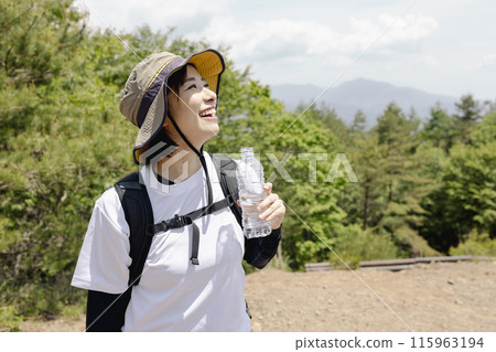 Woman enjoying hiking 115963194