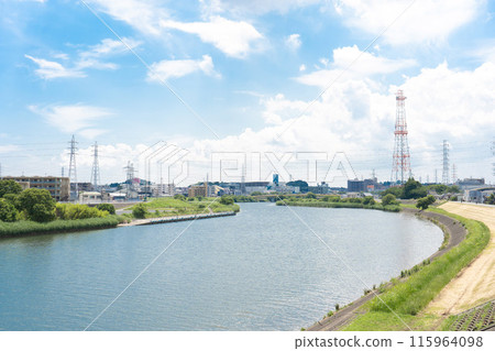 The Tsurumi River on a clear day with the Tarutsuna Bridge and radio tower visible in the background The Tsurumi River on a clear day with the Tarutsuna Bridge and radio tower visible in the background 115964098