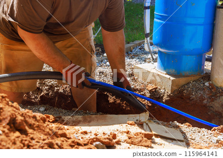 To isolate the water pvc pipe from outside environment, plumber applied thermal insulation before installing pipe To isolate the water pvc pipe from outside environment, plumber applied thermal insulation before installing pipe 115964141