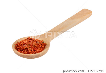 pile of red pepper in wood spoon on white background 115965798