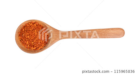 pile of red pepper in wood spoon on white background 115965836