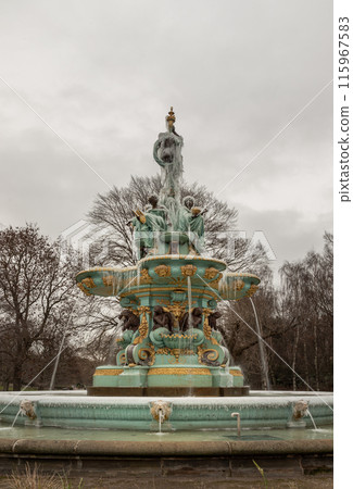 View of Ross Fountain in Princes Street Garden covered in ice in the centre of Edinburgh. View of Ross Fountain in Princes Street Garden covered in ice in the centre of Edinburgh. 115967583