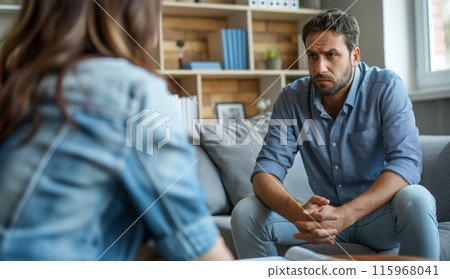 Male Patient Sitting on Couch 115968041