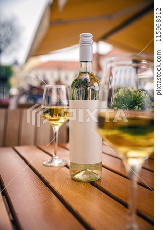 Bottle of white wine with blank label 115968512
