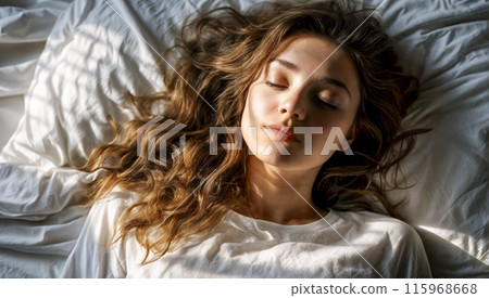 Young Woman Sleeping Peacefully in Bed Young Woman Sleeping Peacefully in Bed 115968668