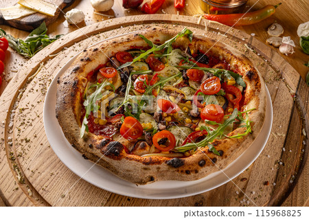Vegetarian pizza with tomatoes 115968825