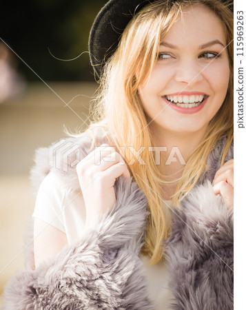 Woman wearing fedora and fur outdoor 115969263