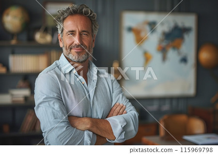 Successful mature businessman smiling confidently with arms crossed in his modern office Successful mature businessman smiling confidently with arms crossed in his modern office 115969798
