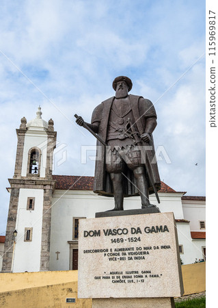 Statue of the famous Portuguese explorer Vasco da Gama overlooking the beach of Praia Vasco da Gama in Sines, Portugal 115969817