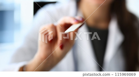 Beautiful smiling female doctor talk with patient 115969869