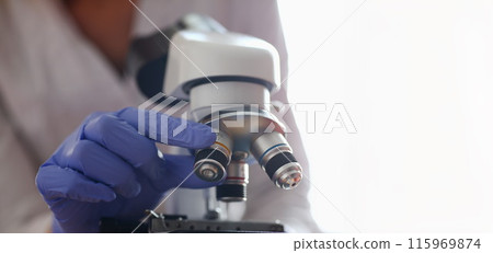 The head microscope on the background of 115969874