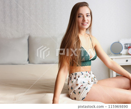 Young beautiful blonde smiling woman portrait 115969890