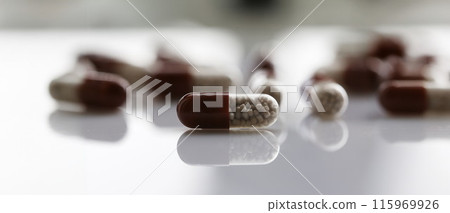 Tablets scattered on the table of the Tablets scattered on the table of the 115969926