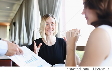 A group of people attending a seminar A group of people attending a seminar 115970403