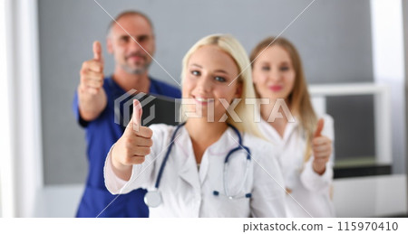 Group of doctor show ok or confirm sign with Group of doctor show ok or confirm sign with 115970410