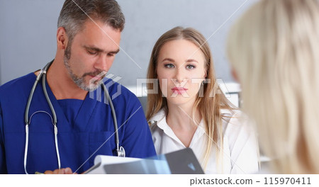 Smiling handsome doctor communicate with 115970411