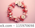 Wreath made of pink and white flowers on pink background 115970698