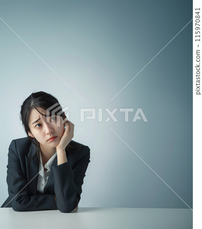 Depressed, worried business woman copy space 115970841