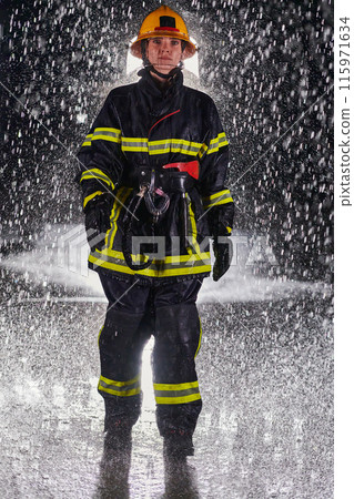 A determined female firefighter in a professional uniform striding through the dangerous, rainy night on a daring rescue mission, showcasing her unwavering bravery and commitment to saving lives. 115971634