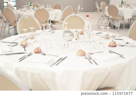 Prepared tables in the restaurant Prepared tables in the restaurant 115971677