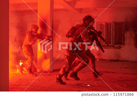 A group of professional soldiers bravely executes a dangerous rescue mission, surrounded by fire in a perilous building. 115971866
