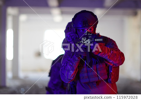 A group of professional soldiers bravely executes a dangerous rescue mission, surrounded by fire in a perilous building. 115972028