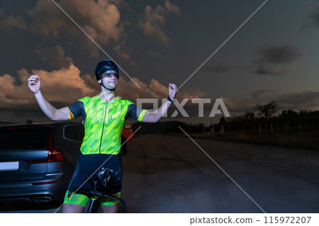 Triathlete in professional gear running early in the morning, preparing for a marathon, dedication to sport and readiness to take on the challenges of a marathon.  115972207