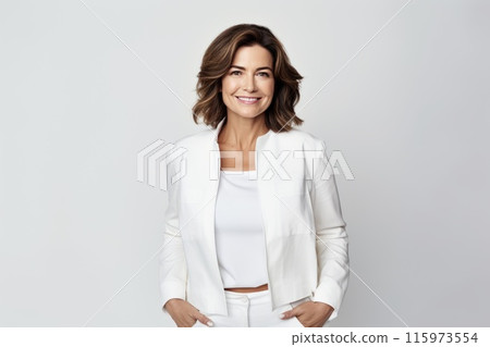Portrait of beautiful happy gorgeous 50s mid age elderly modern woman with brunette short haircut in white blouse. Copy space. 115973554