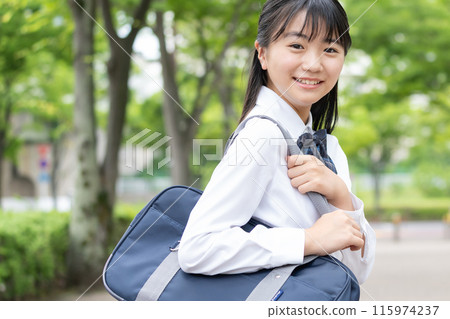 School girls with school bags School girls with school bags 115974237