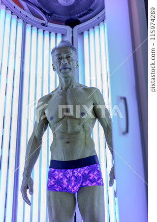 Tanning salon senior man Tanning salon senior man 115974289